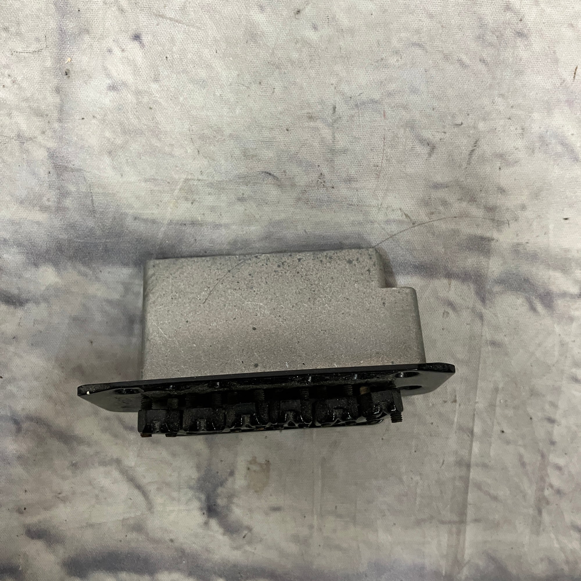 Unknown Black Guitar Bridge