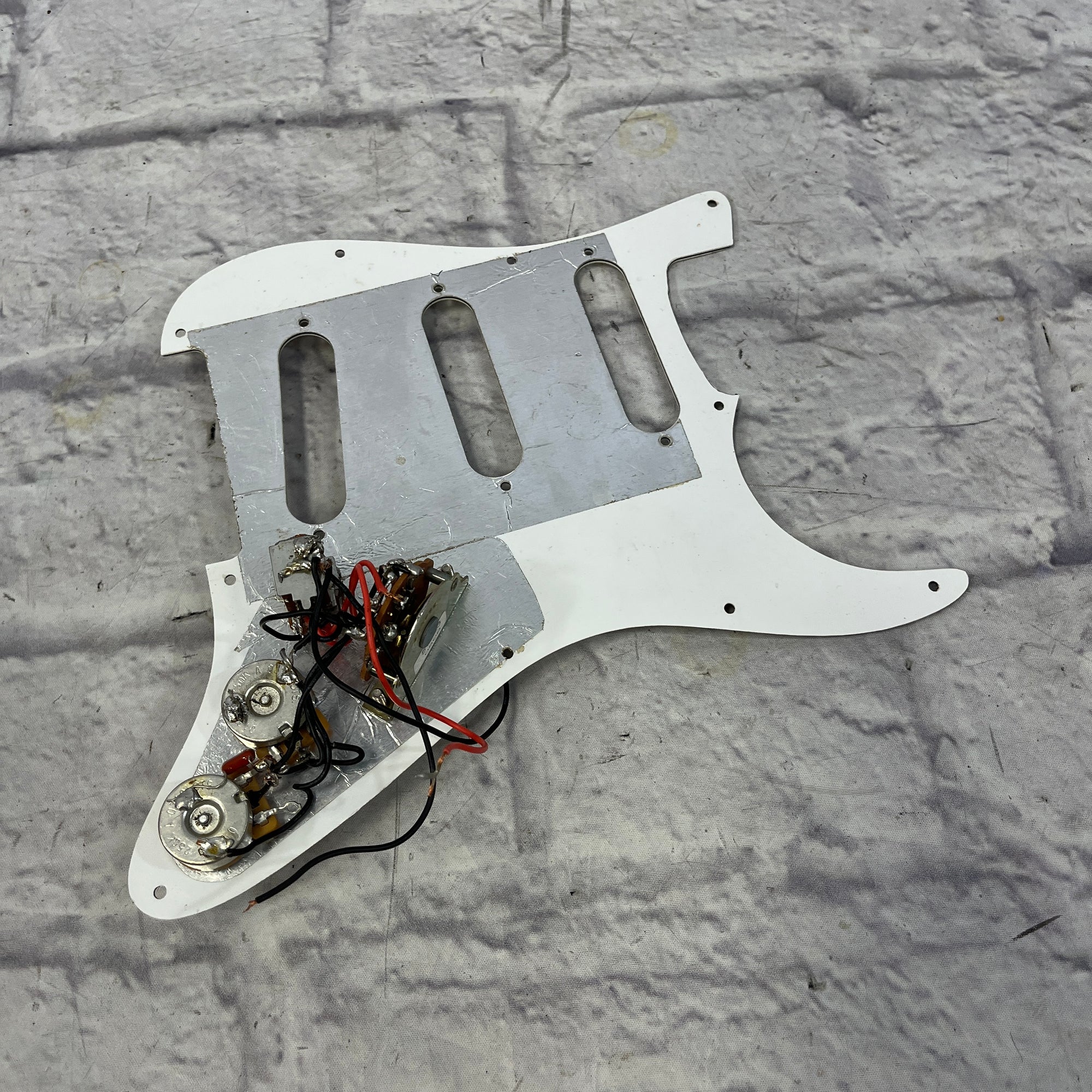 Unknown Strat Pickguard SSS w/ Pots & Switch