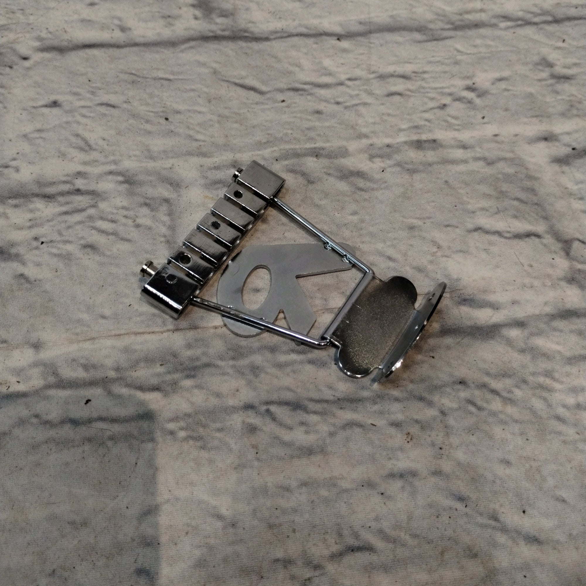 Unknown "R" Guitar Tailpiece