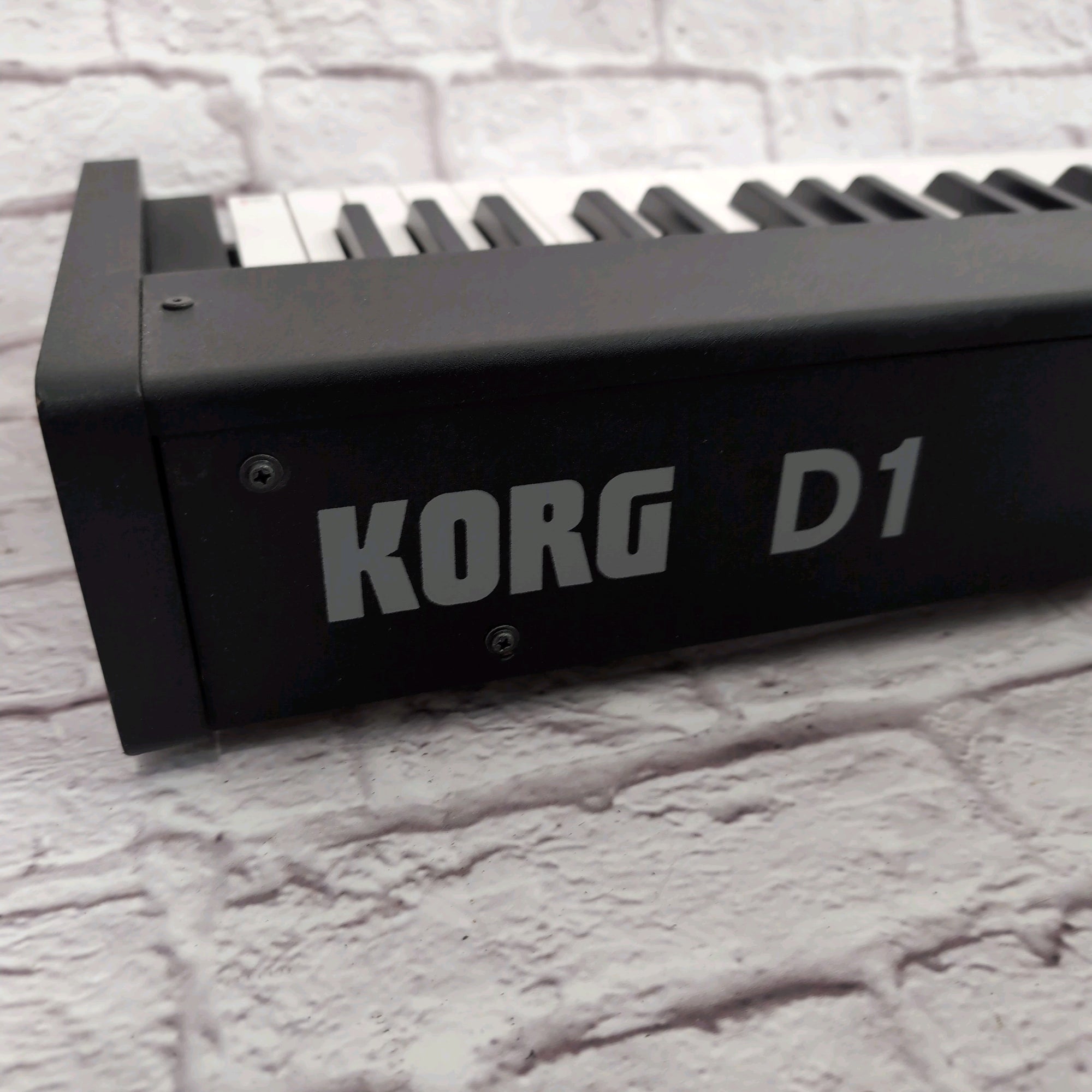 Korg D1 Slimline 88-Key Digital Stage Piano - Black w/ Sustain Pedal