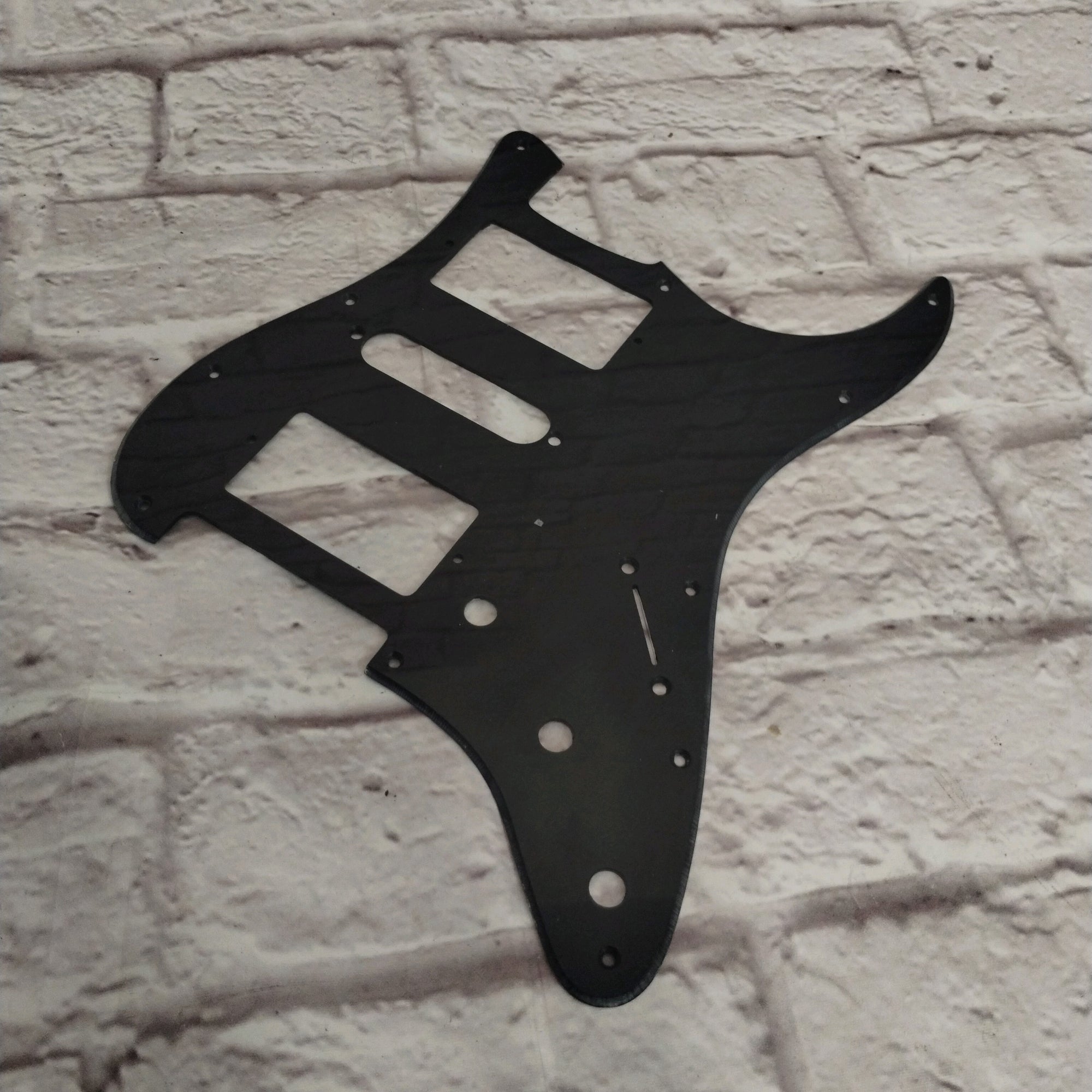 Unknown Black HSH Strat Pickguard