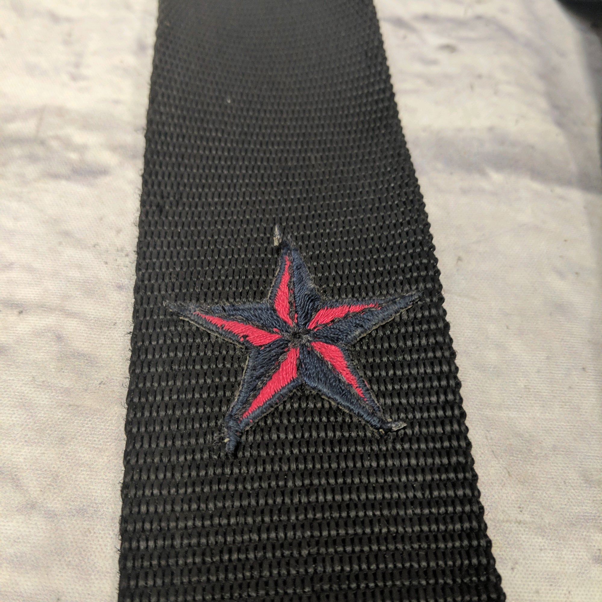 Levy's Black Strap With Red Star Strap