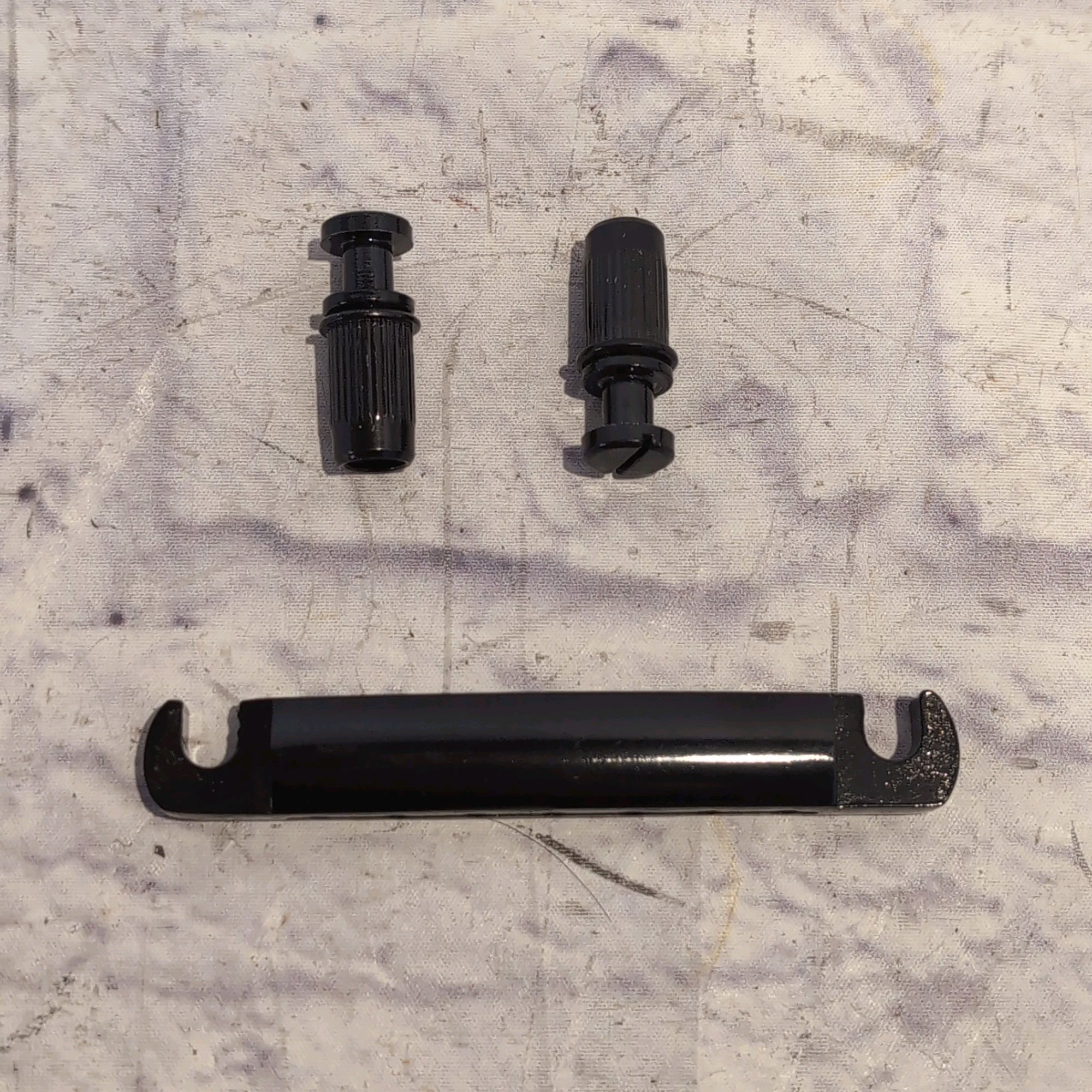 Black 7 String Stop Bar Tailpiece with Anchors and Studs