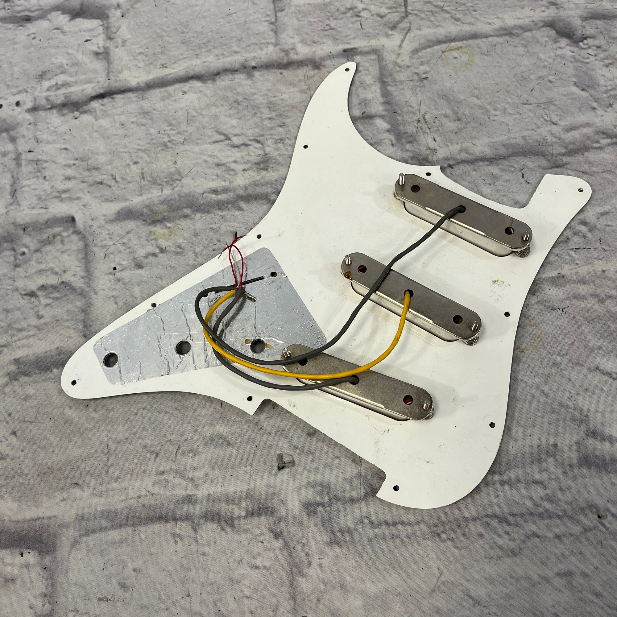Unknown Strat Pickguard SSS w/ Stock Pickups