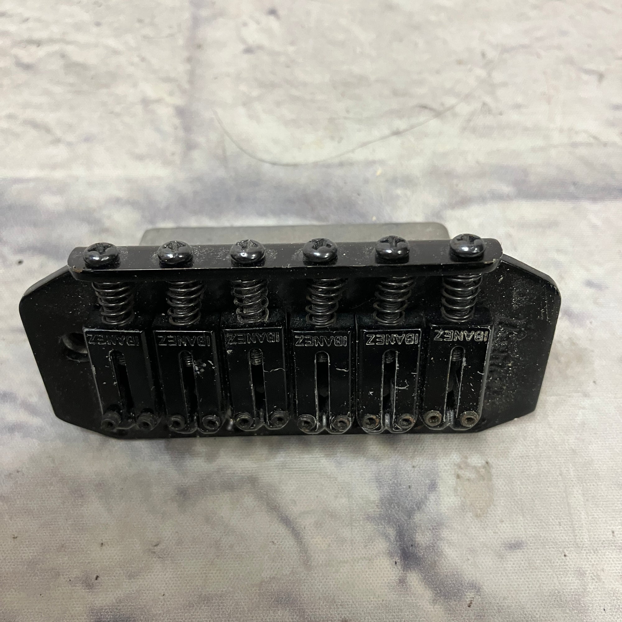 Unknown Black Guitar Bridge