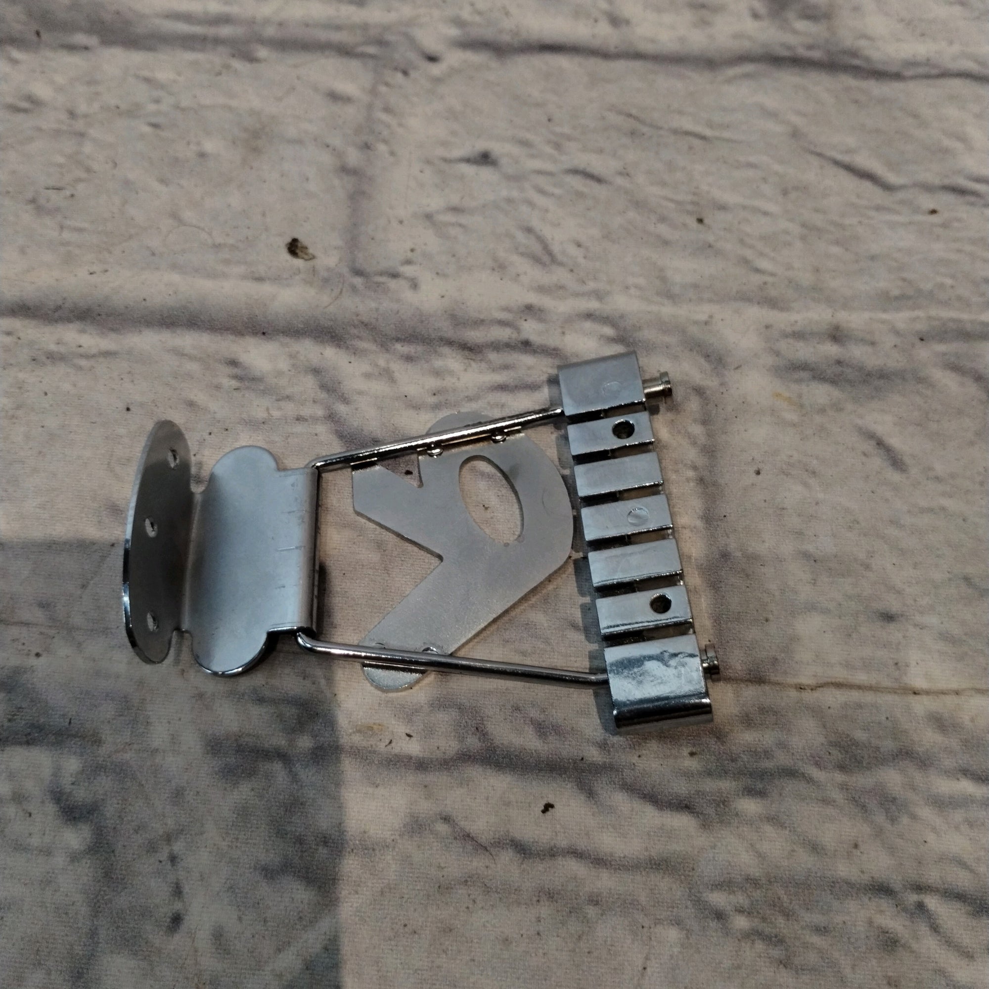 Unknown "R" Guitar Tailpiece