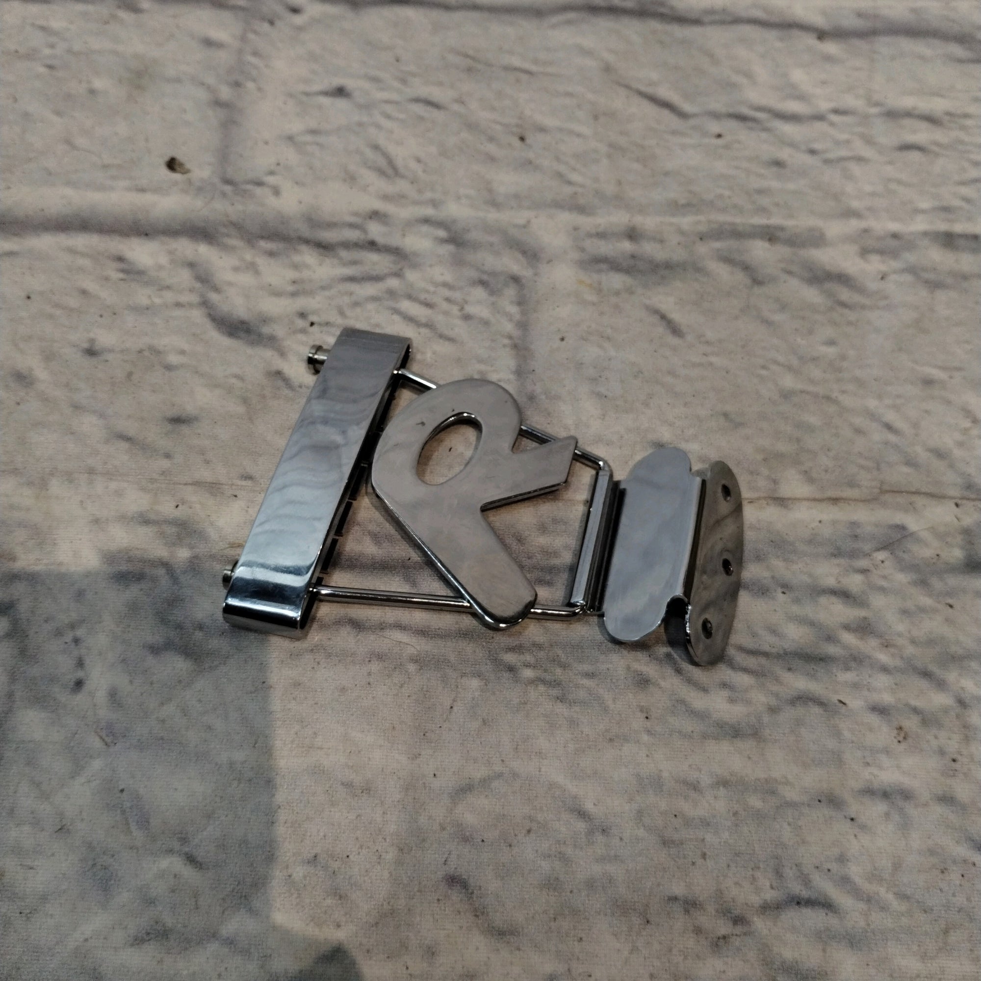 Unknown "R" Guitar Tailpiece