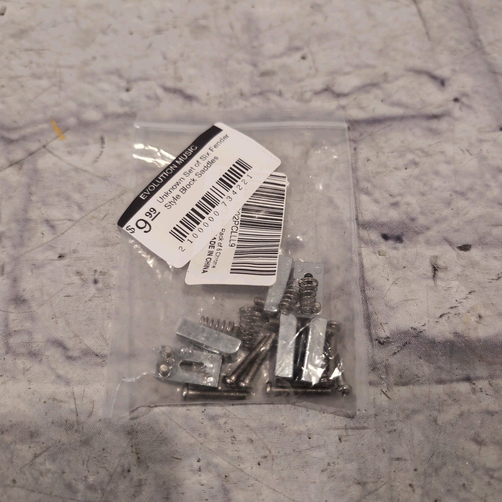 Unknown Set of Six Fender Style Block Saddles