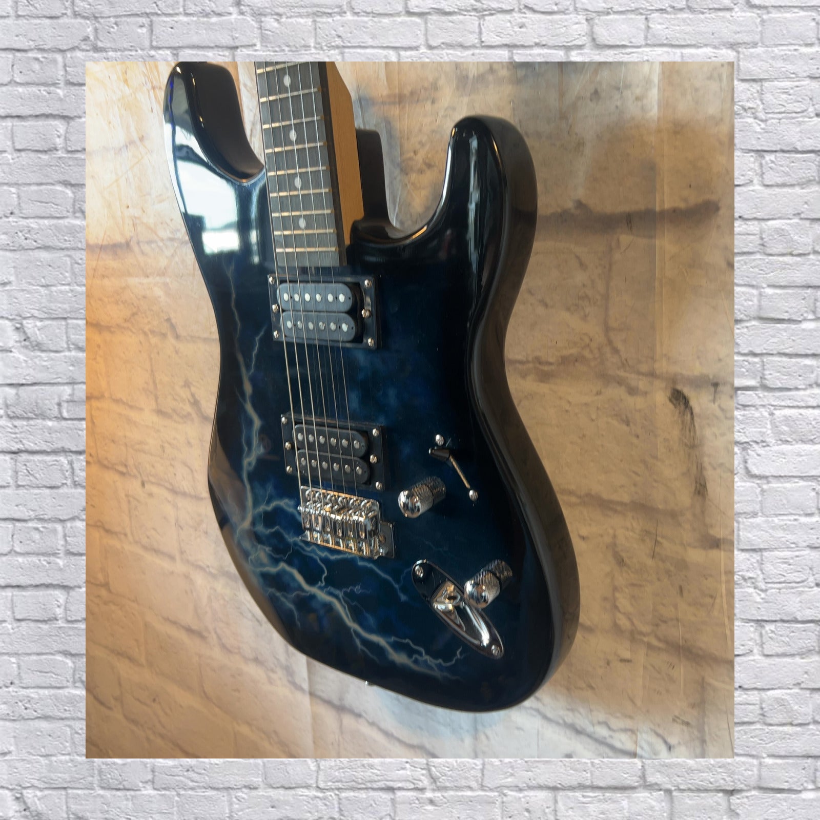 Unknown Strat Style Electric Guitar with Lightning Graphic