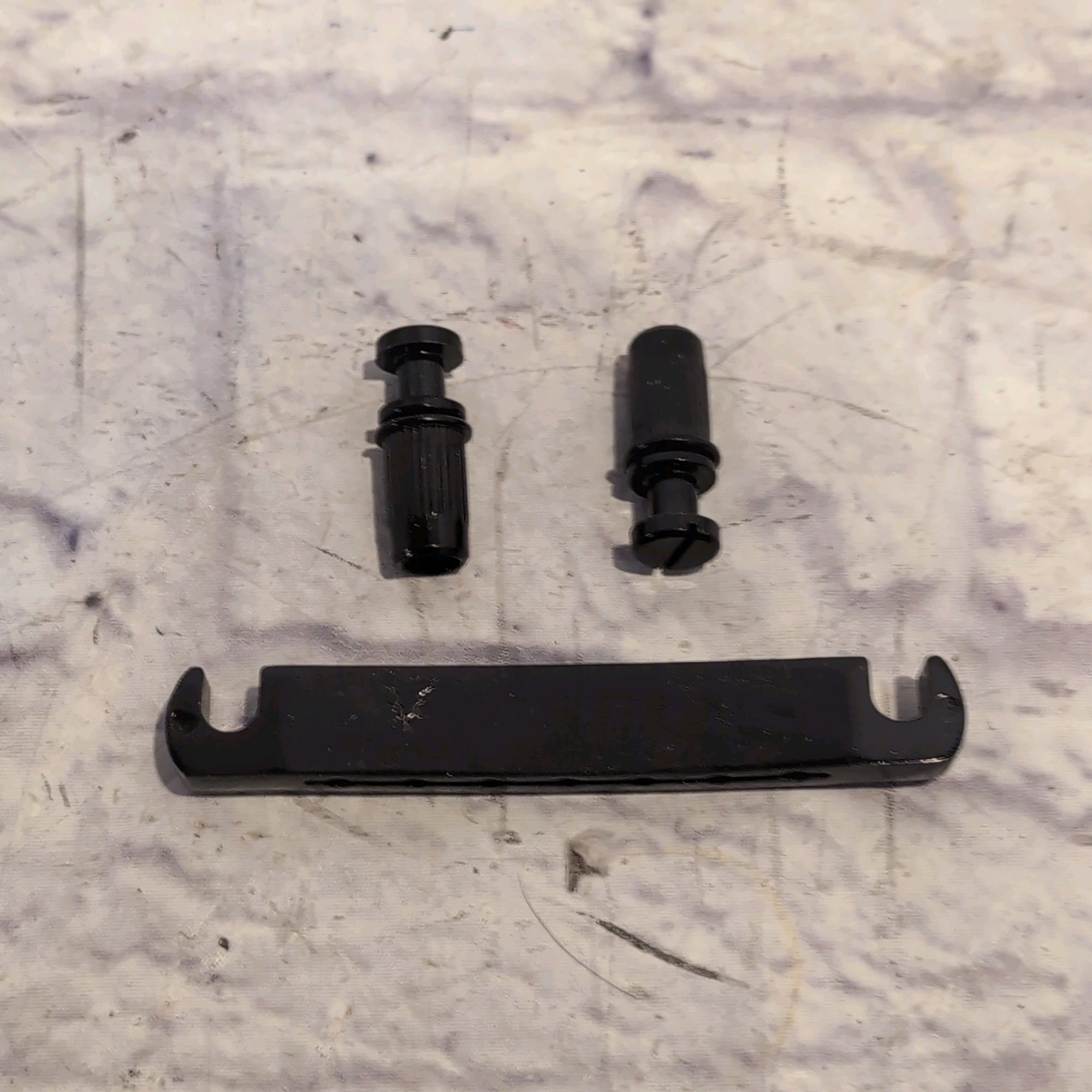 Black 7 String Stop Bar Tailpiece with Anchors and Studs