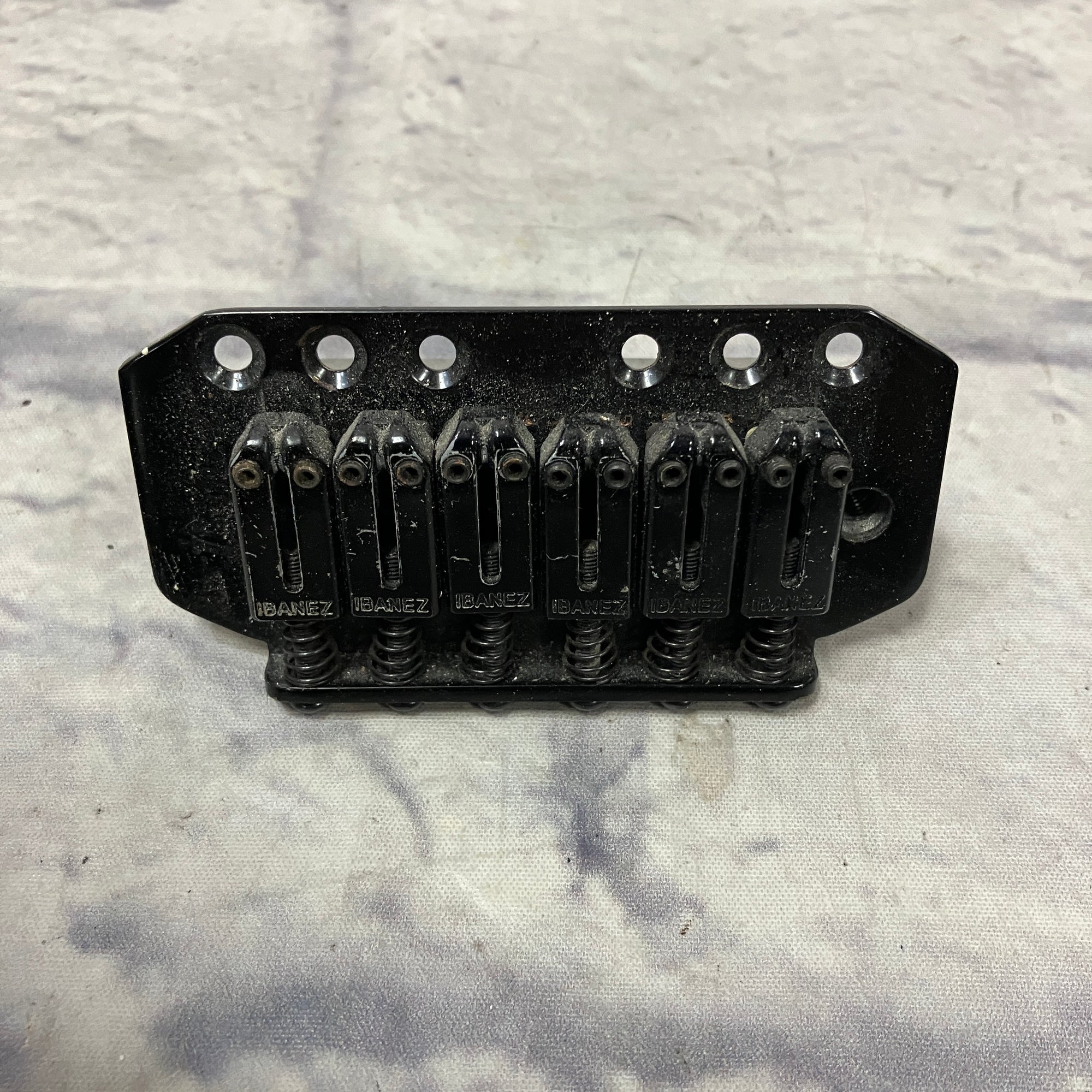 Unknown Black Guitar Bridge