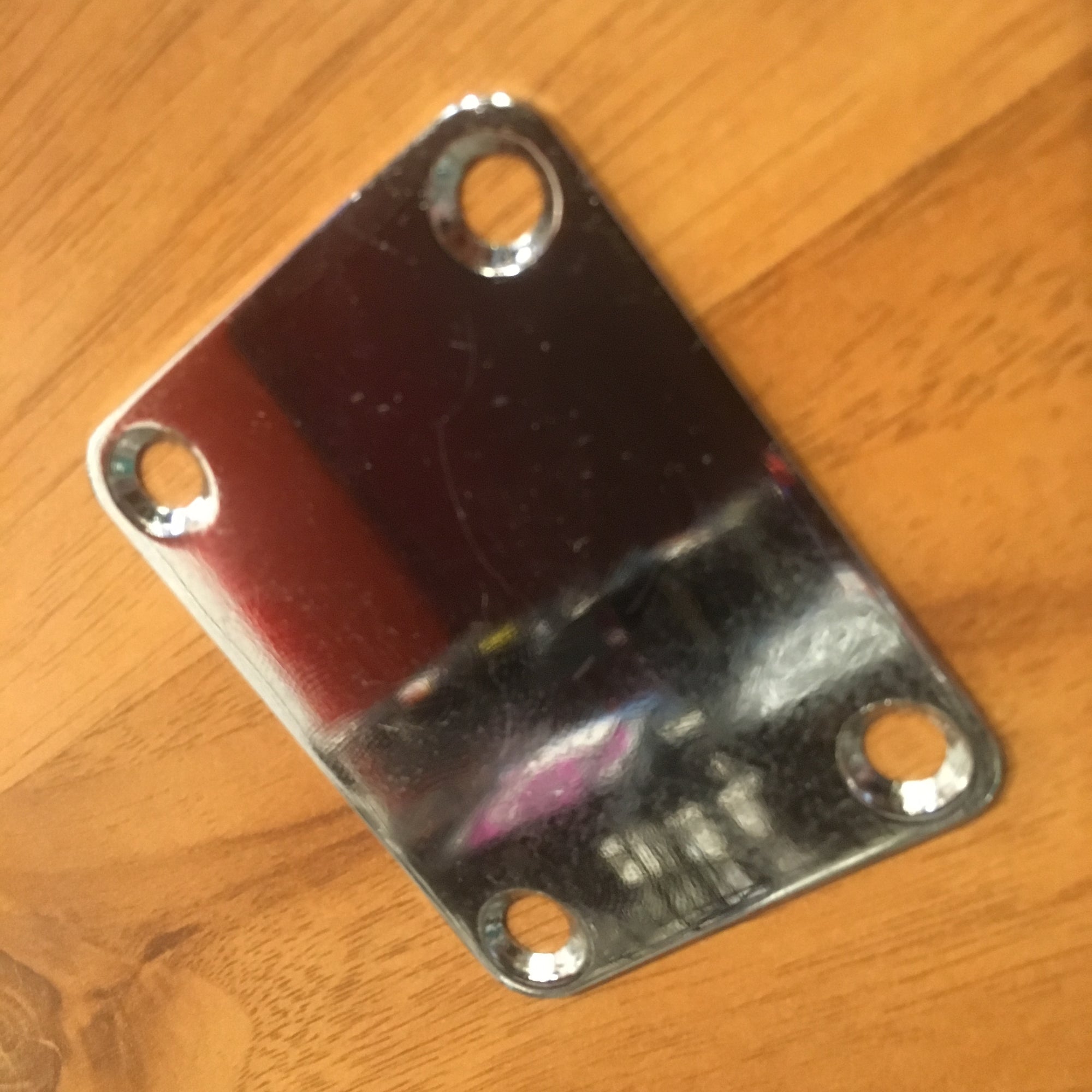 Unmarked Chrome Neck Plate