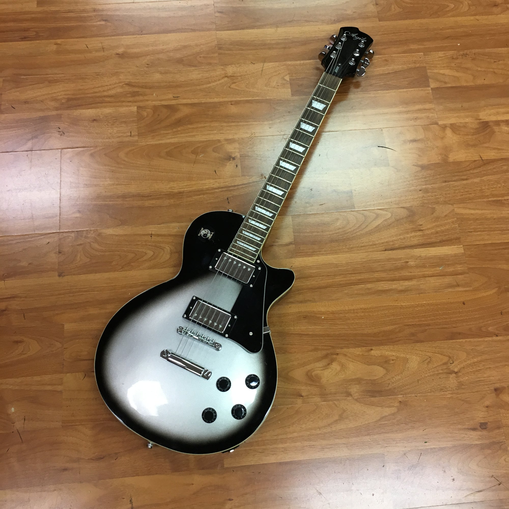 Agile 2000 LP Style Silver Burst