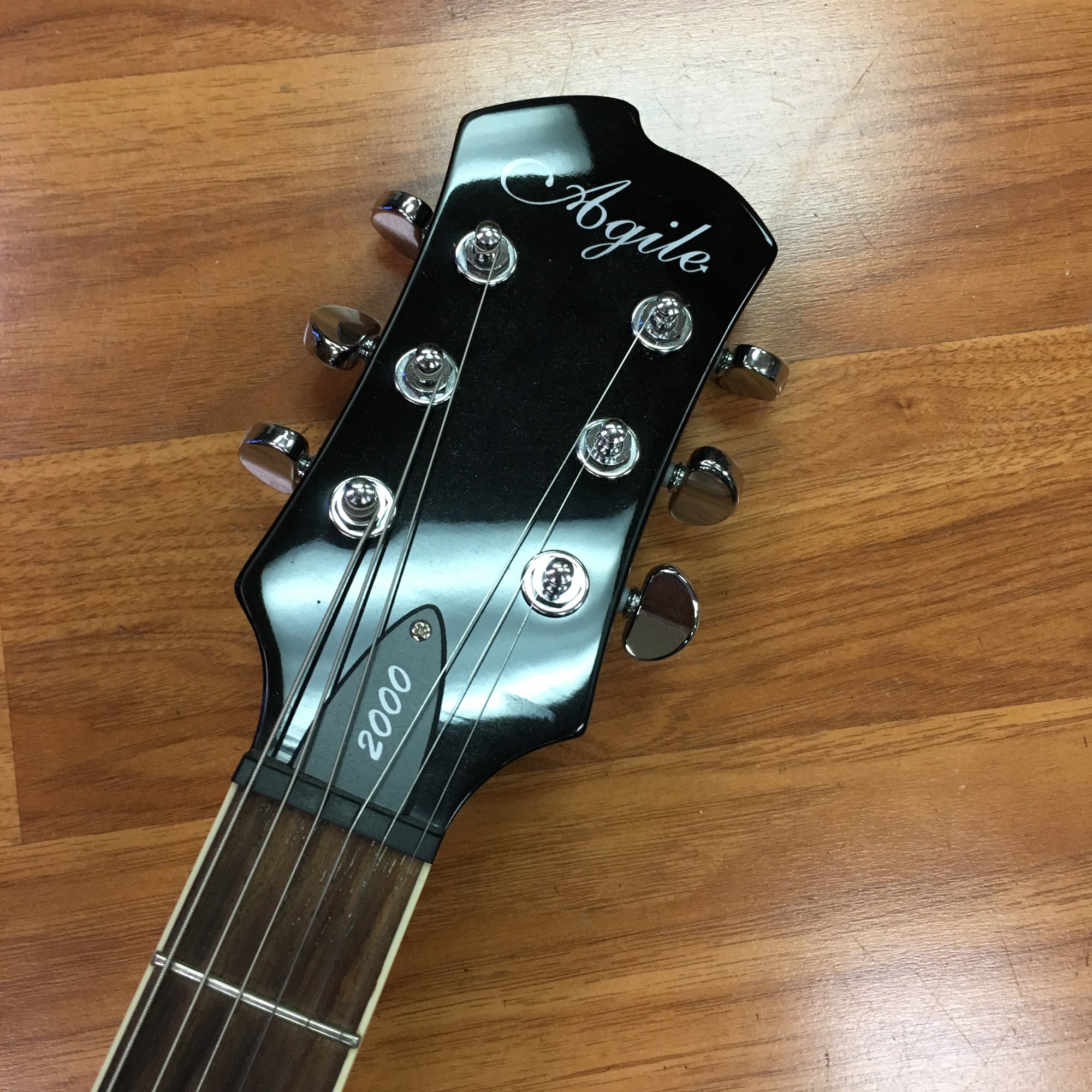 Agile 2000 LP Style Silver Burst