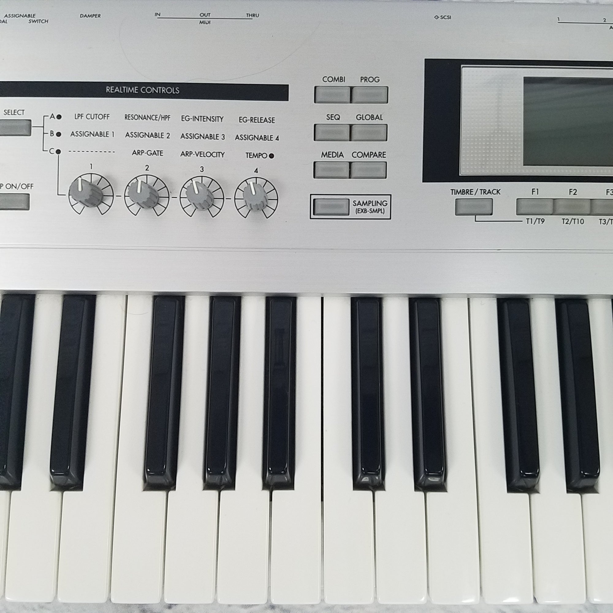 Korg Triton LE 76 Workstation with EXB-SMPL Sampler Package - Evolution  Music