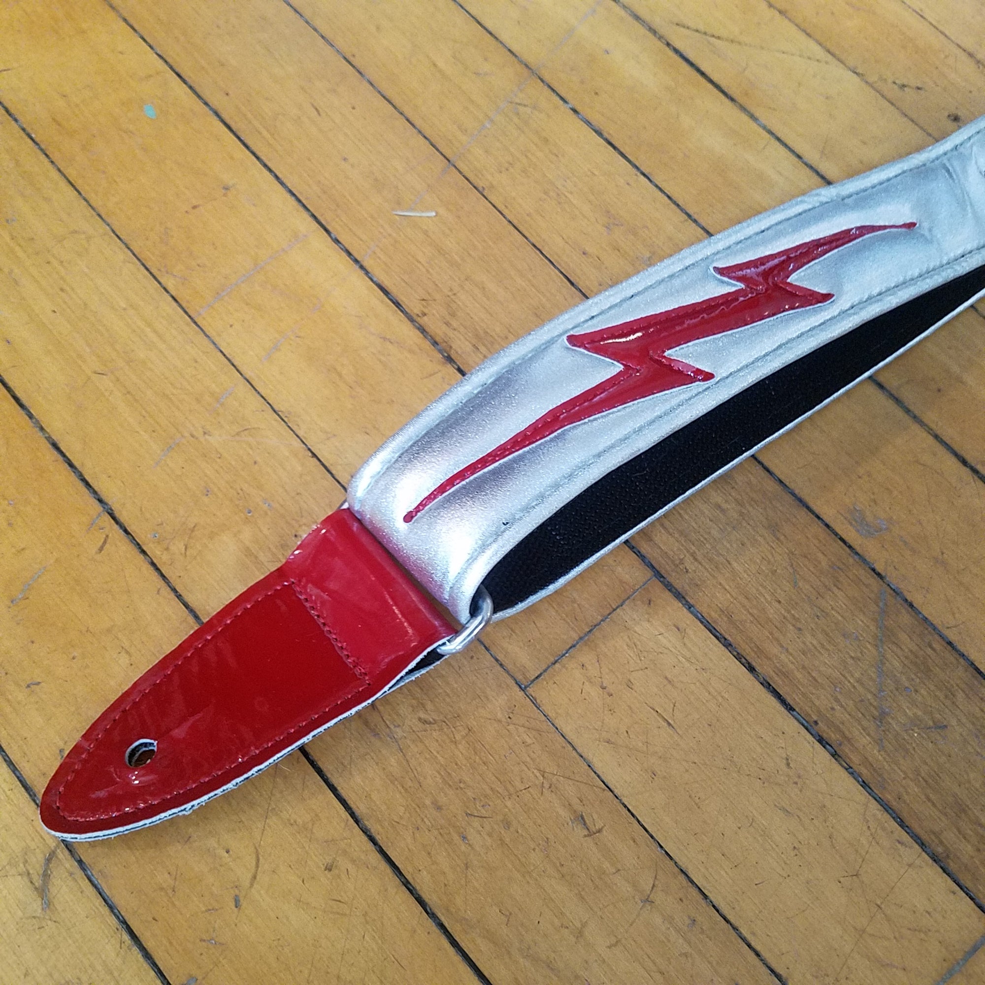 Jodi Head Silver and Red Bolt Slider Guitar Strap