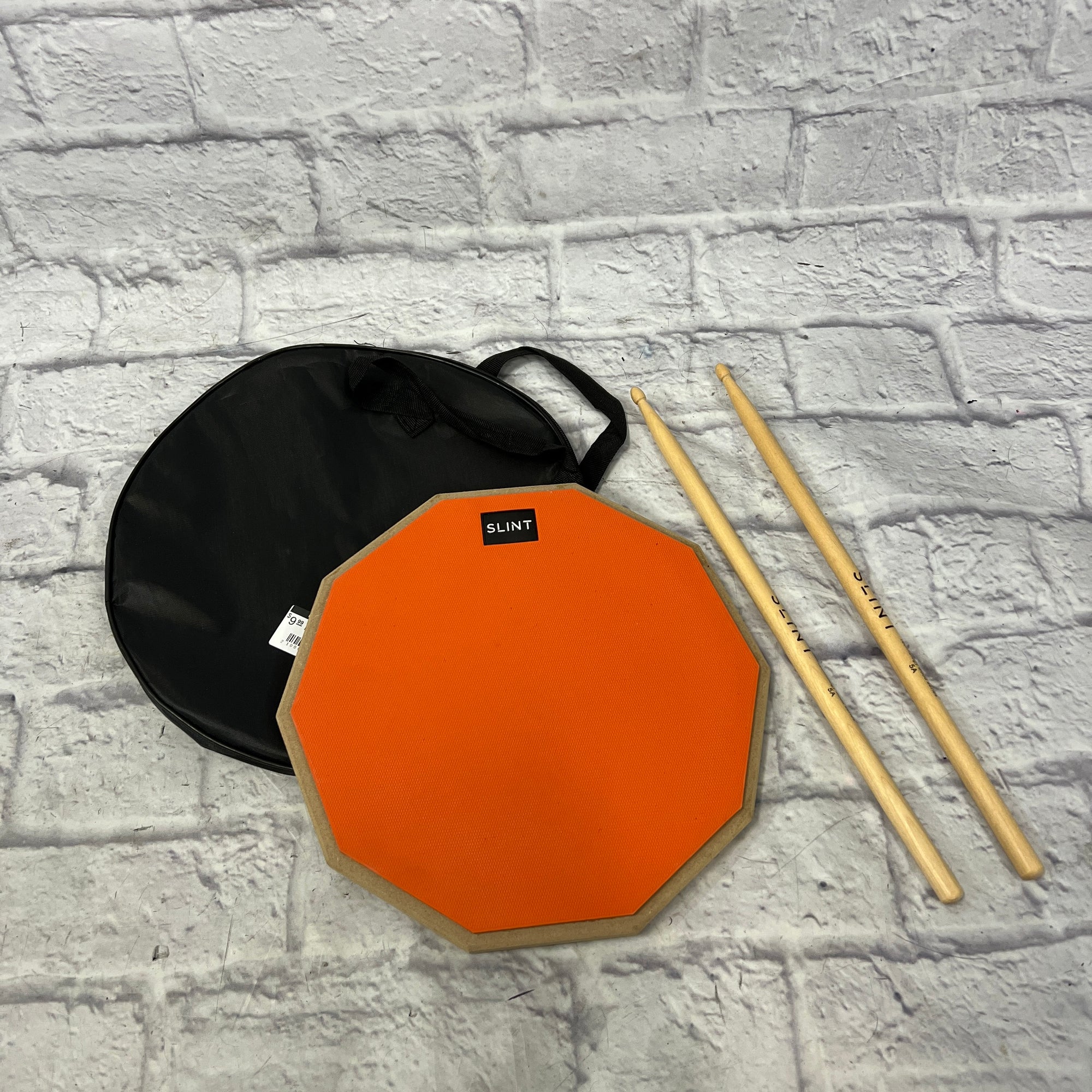 Unknown Practice Drum Pad with Sticks