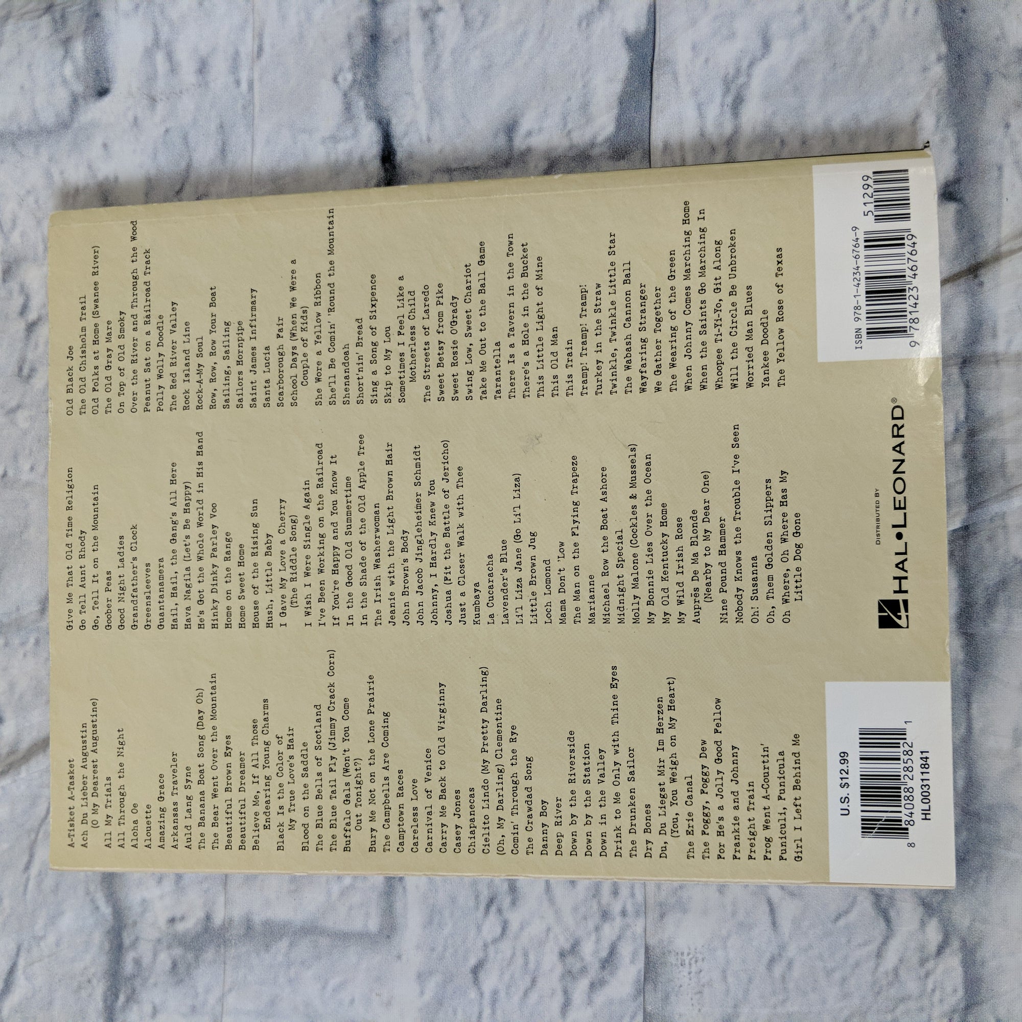 Hal Leonard Folk Songs Budget Book arranged for piano, vocal, and guitar (P/V/G)