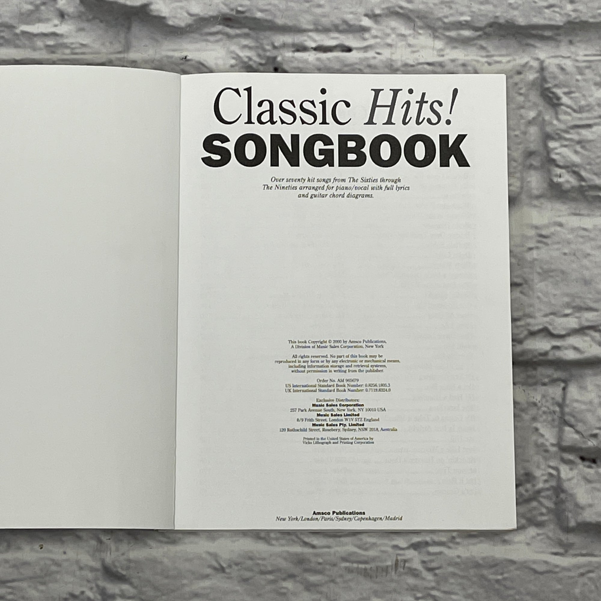 Amsco The Library of Classic Hits! Guitar/Piano/Vocal Book