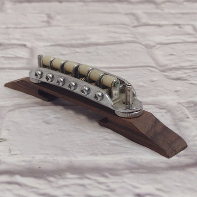 Unknown Archtop Guitar Bridge with Nylon Roller Saddles