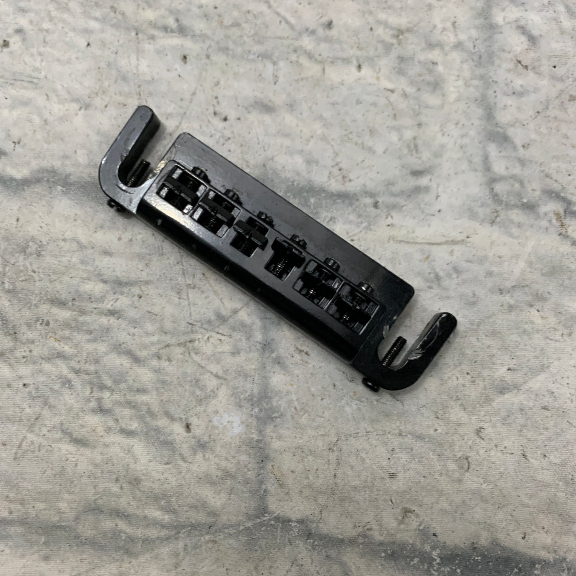 Unknown Wraparound Guitar Tailpiece