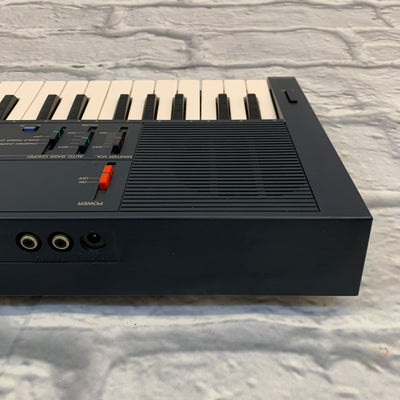 Vintage 80s Yamaha PSS 450 FM Mini Electone Keyboard Synthesizer w/ Drum Machine