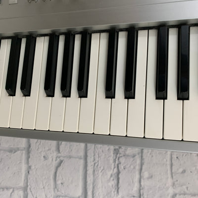 Korg Triton Le Studio Digital Synthesizer Keyboard Sampler 88-Key Workstation with SKB Rolling Hard Case