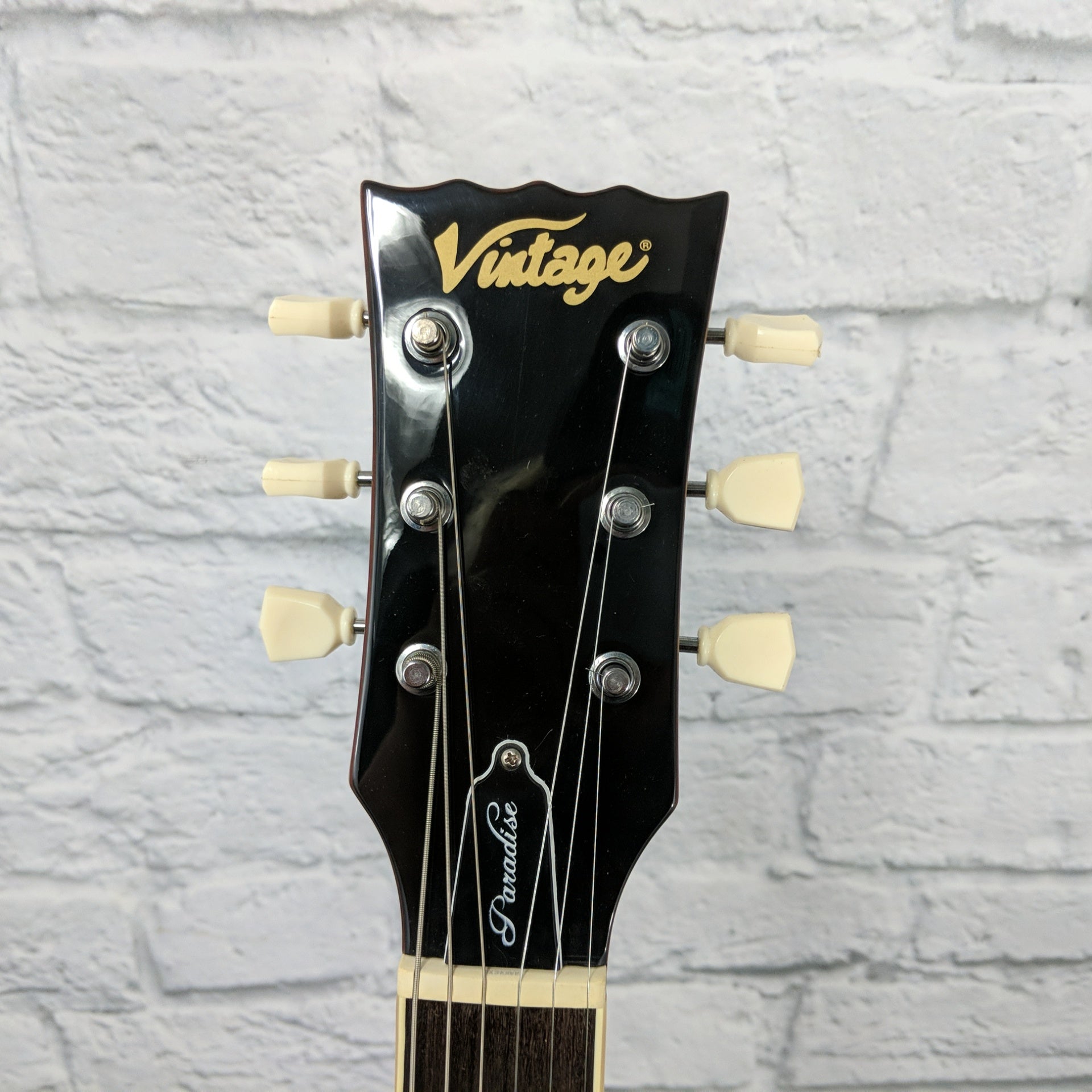 Vintage V100AFD Reissued Paradise Flamed Amber Guitar