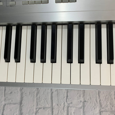Korg Triton Le Studio Digital Synthesizer Keyboard Sampler 88-Key Workstation with SKB Rolling Hard Case
