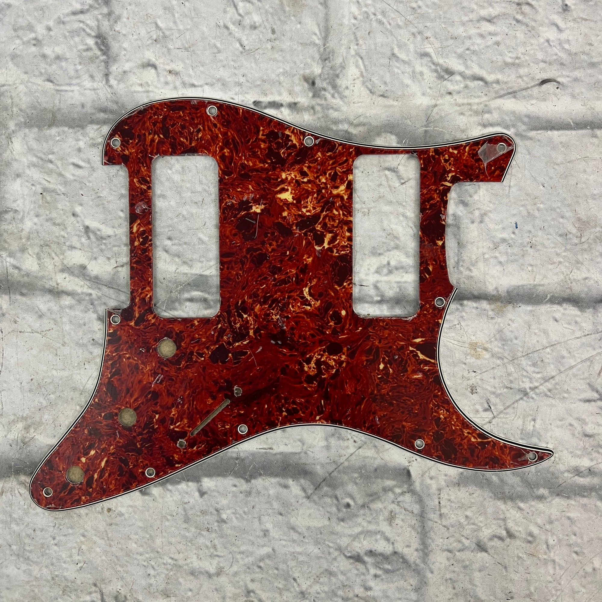 Unknown 11-Screw Strat Pickguard - Reddish Tortoiseshell