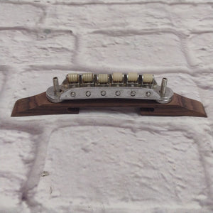 Unknown Archtop Guitar Bridge with Nylon Roller Saddles