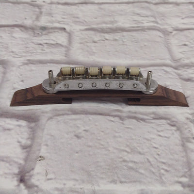 Unknown Archtop Guitar Bridge with Nylon Roller Saddles