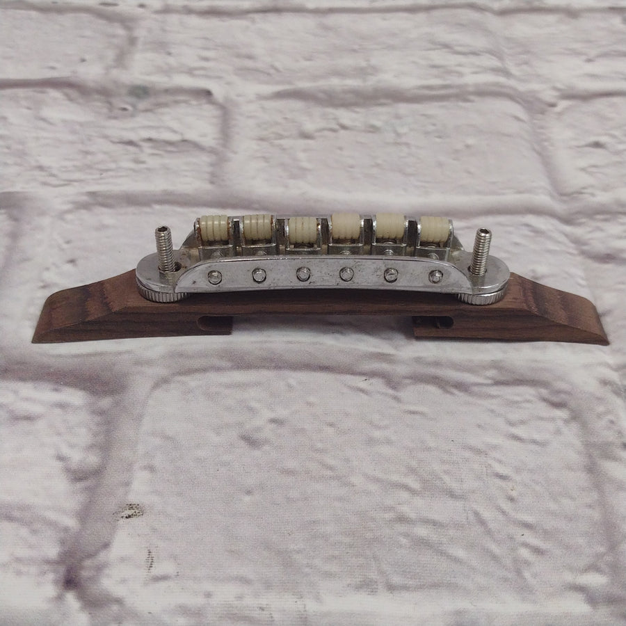 Unknown Archtop Guitar Bridge with Nylon Roller Saddles