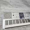 Yamaha PSR-E323 76-Key Electronic Keyboard with Power Supply