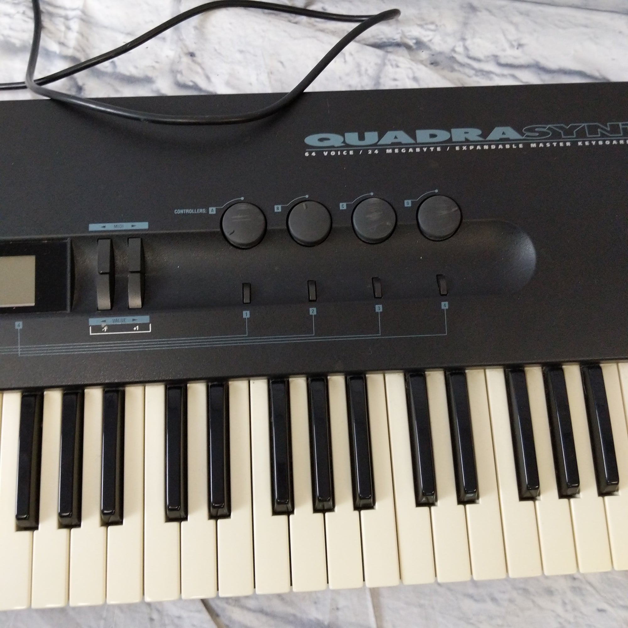 Alesis QuadraSynth Plus Piano Synthesizer
