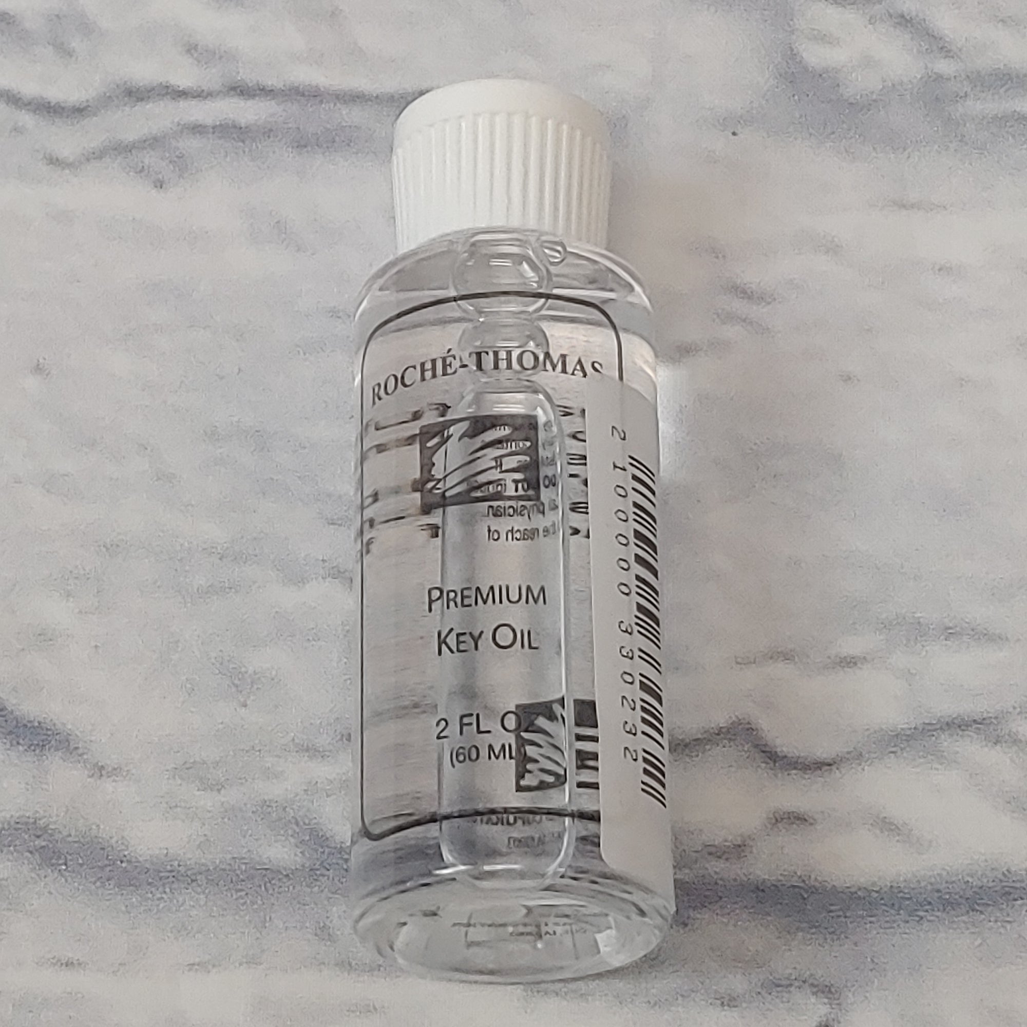 Roche-Thomas Premium Key Oil 2 oz.