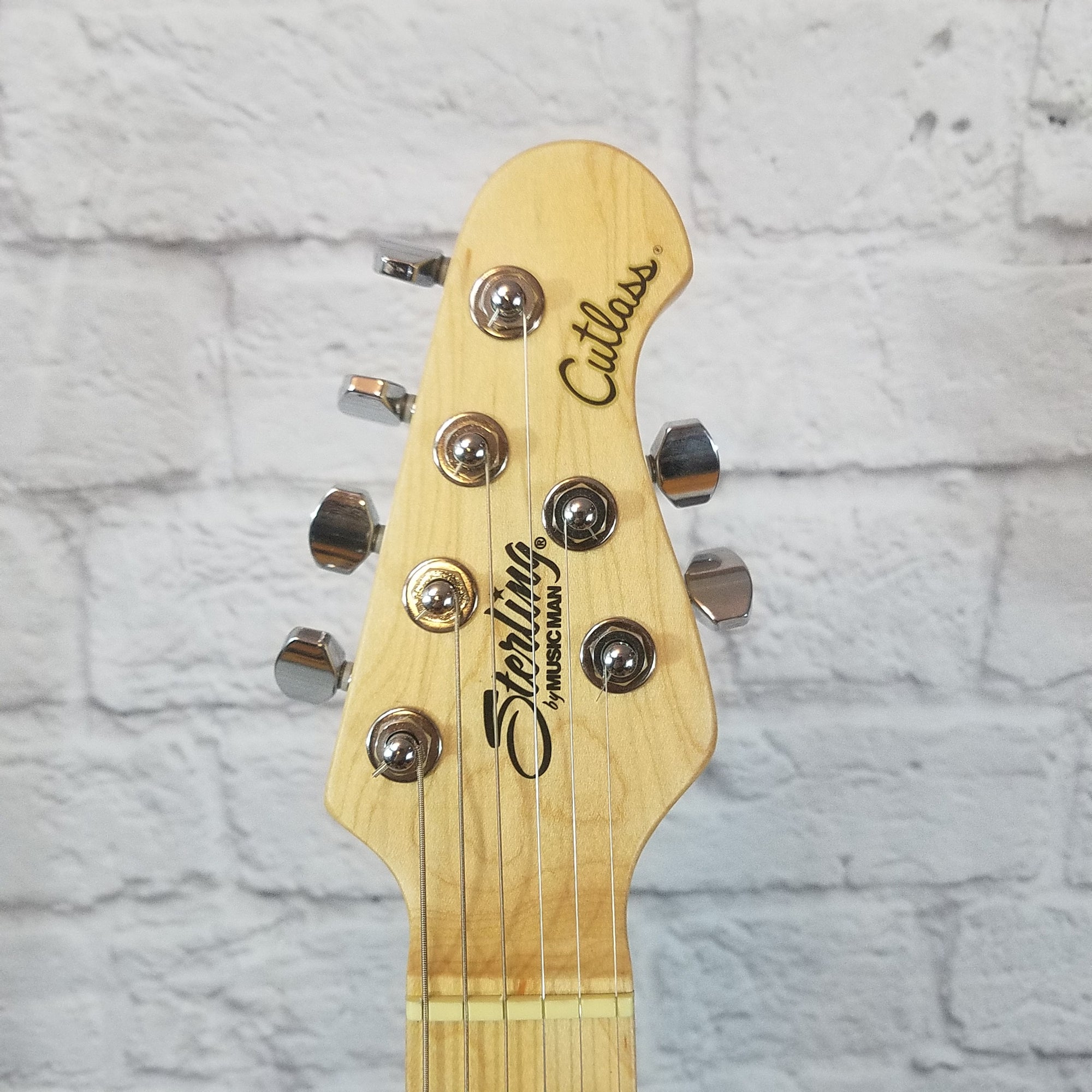 Sterling by Musicman Cutlass SSS strat style