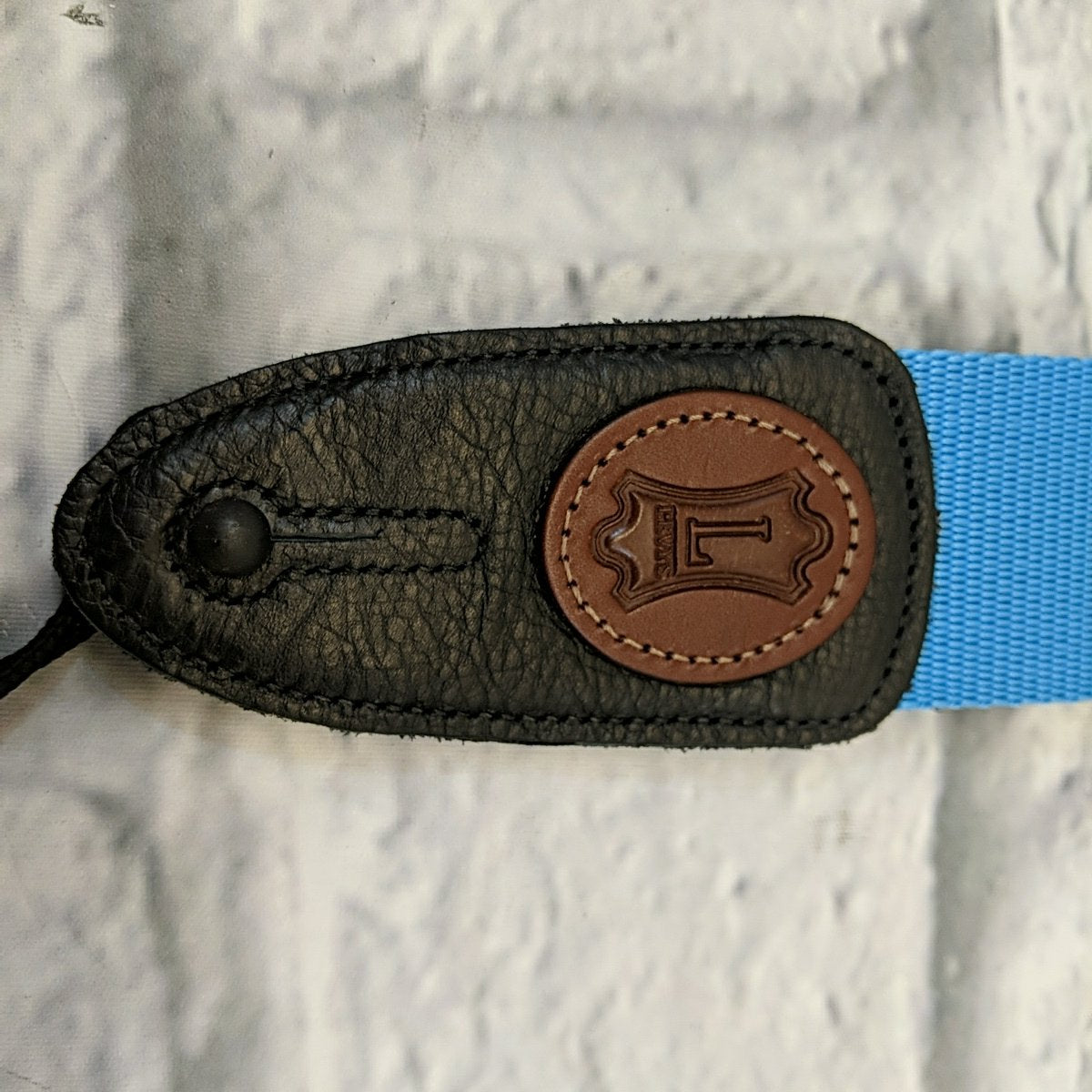 Levy's MSS8 Light Blue 2" Wide Soft-hand Polypropylene Guitar Strap with Black Leather Ends