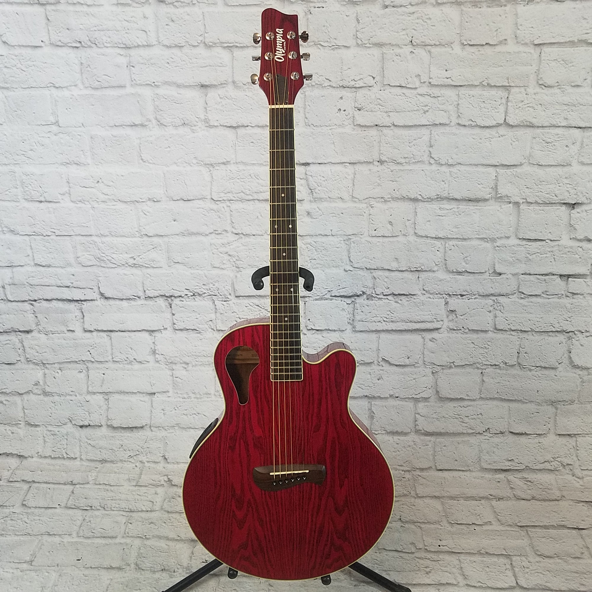 Olympia deals acoustic guitar