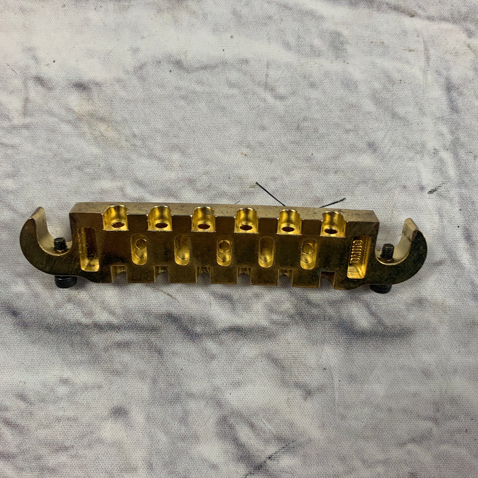 Sung IL Gold Wrap Around Tailpiece with Mounting Studs