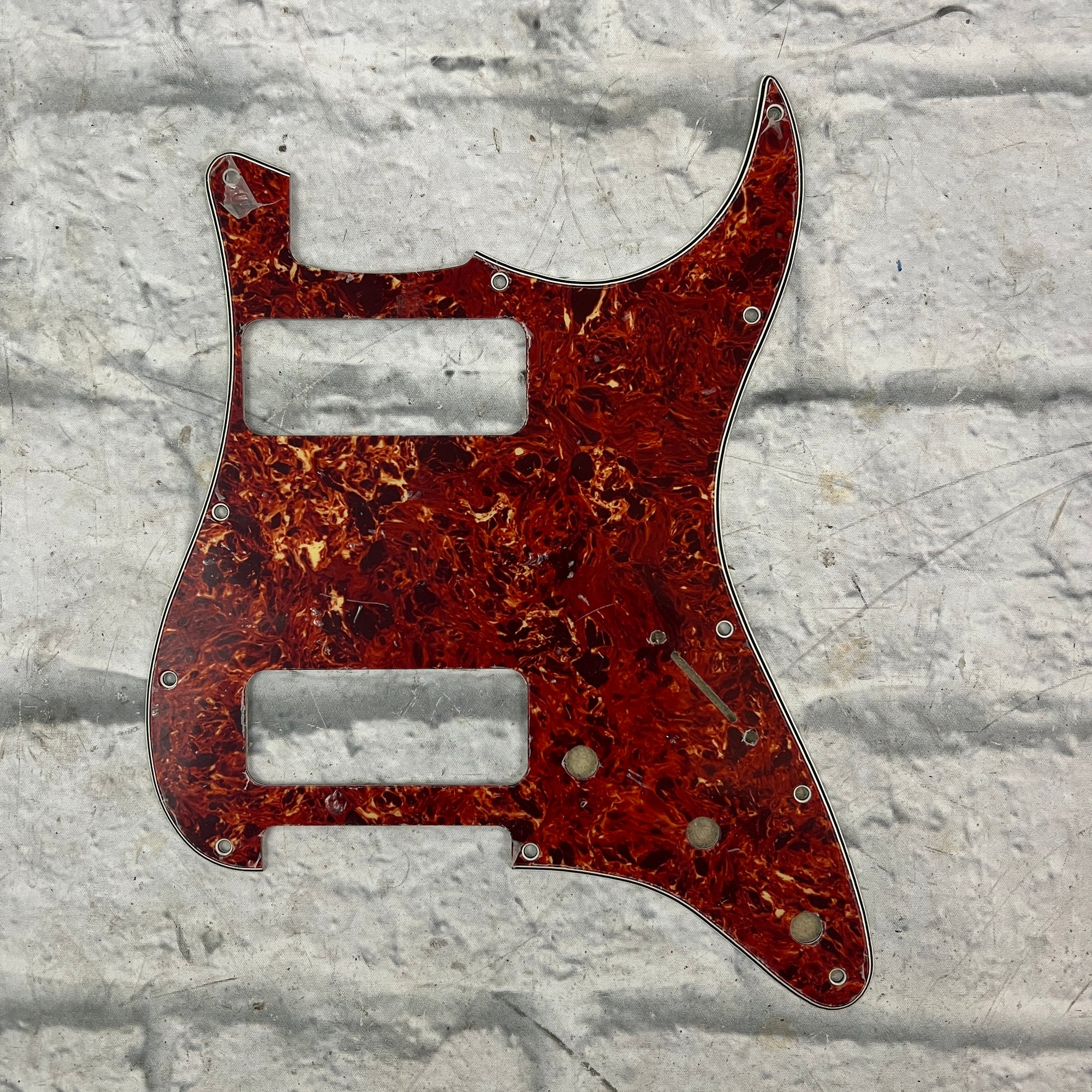 Unknown 11-Screw Strat Pickguard - Reddish Tortoiseshell