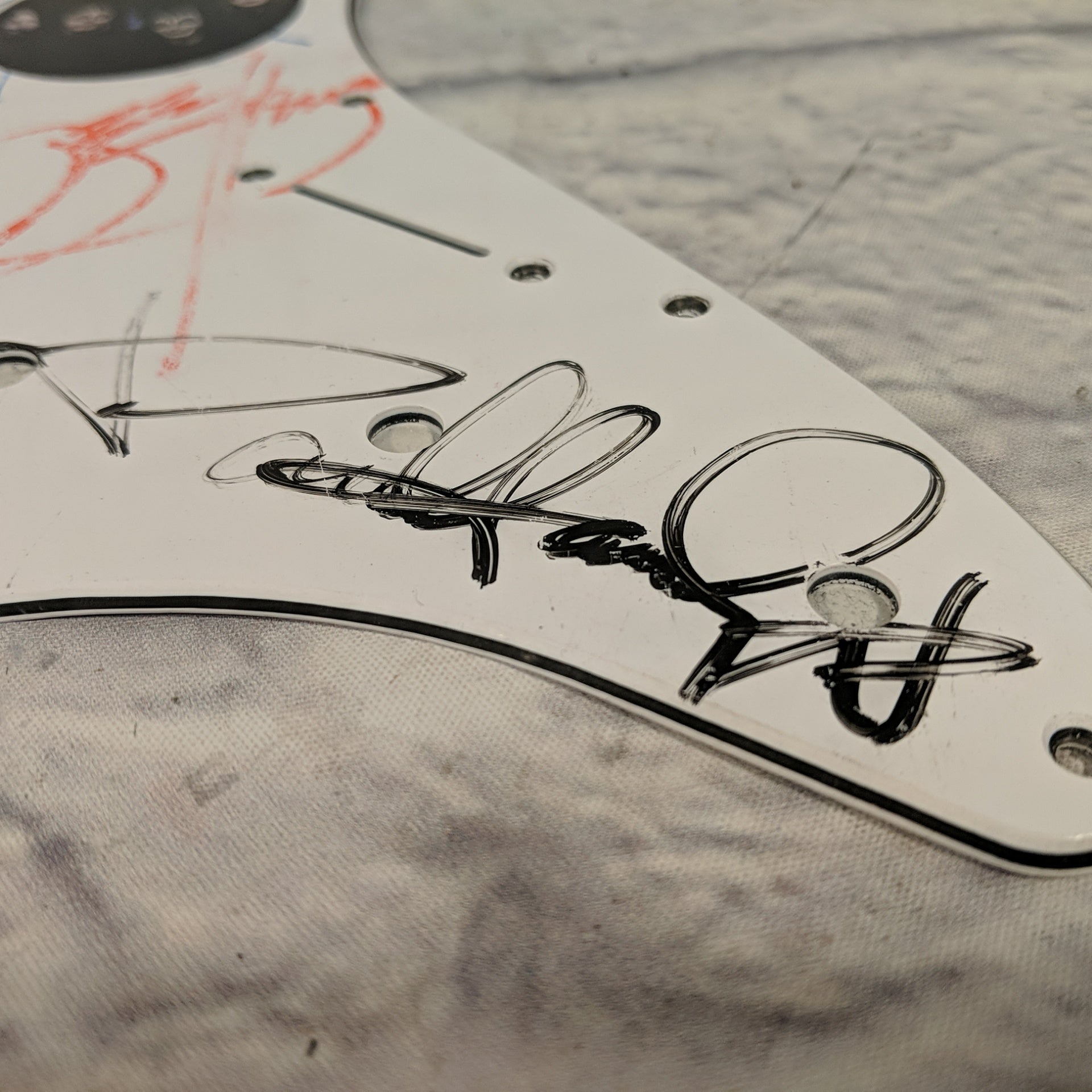 White Strat Pickguard Signed by KISS with Certificate of Authenticity