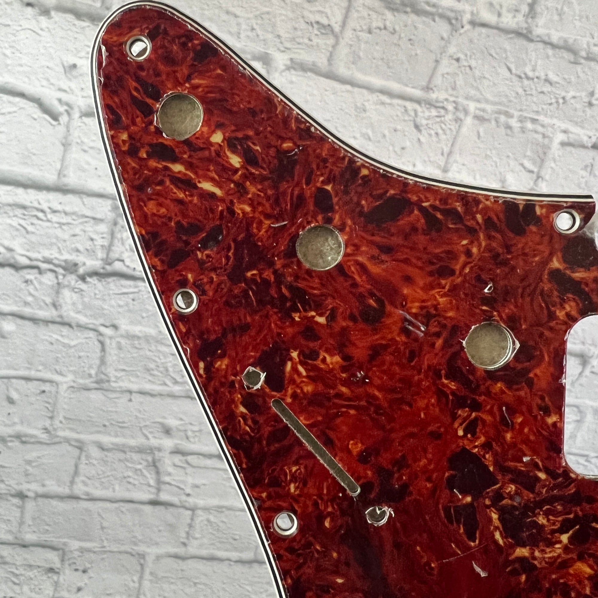 Unknown 11-Screw Strat Pickguard - Reddish Tortoiseshell