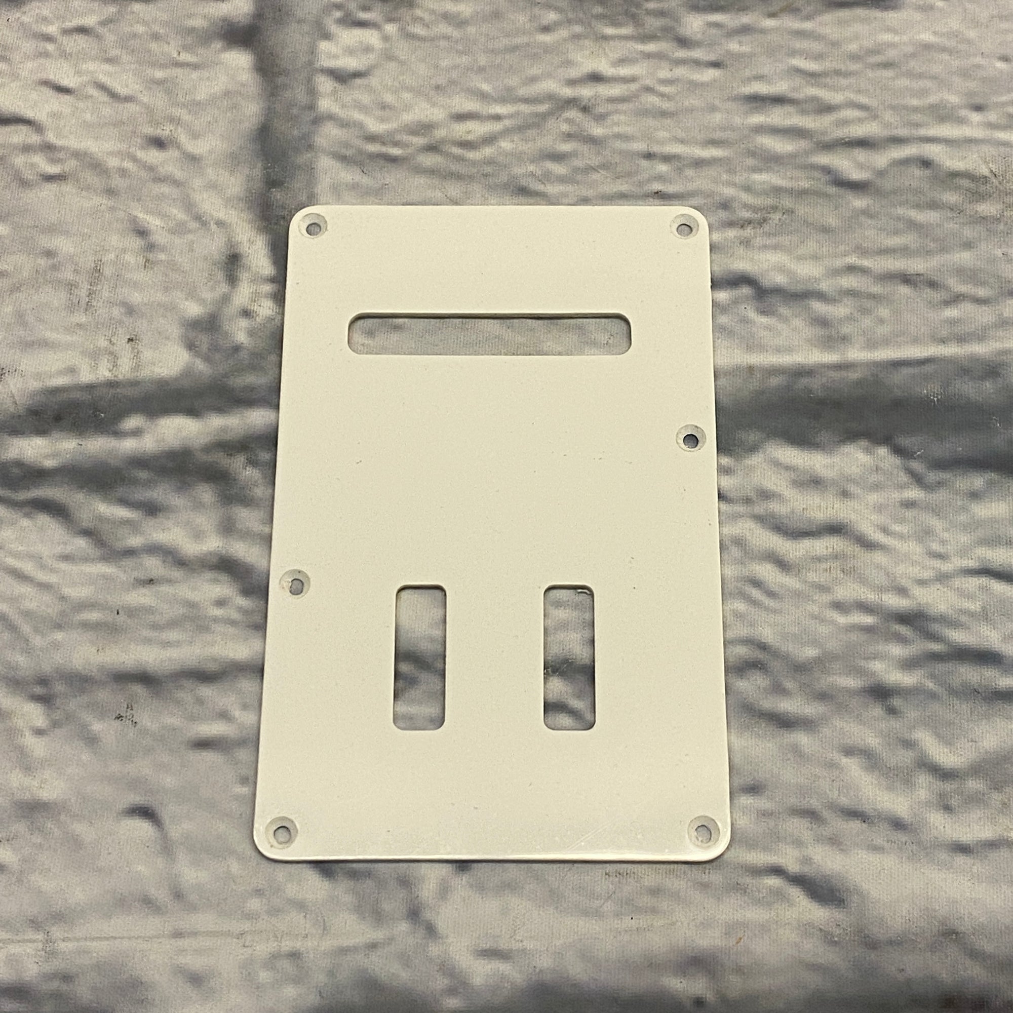Unknown White Back Plate/Trem Guard