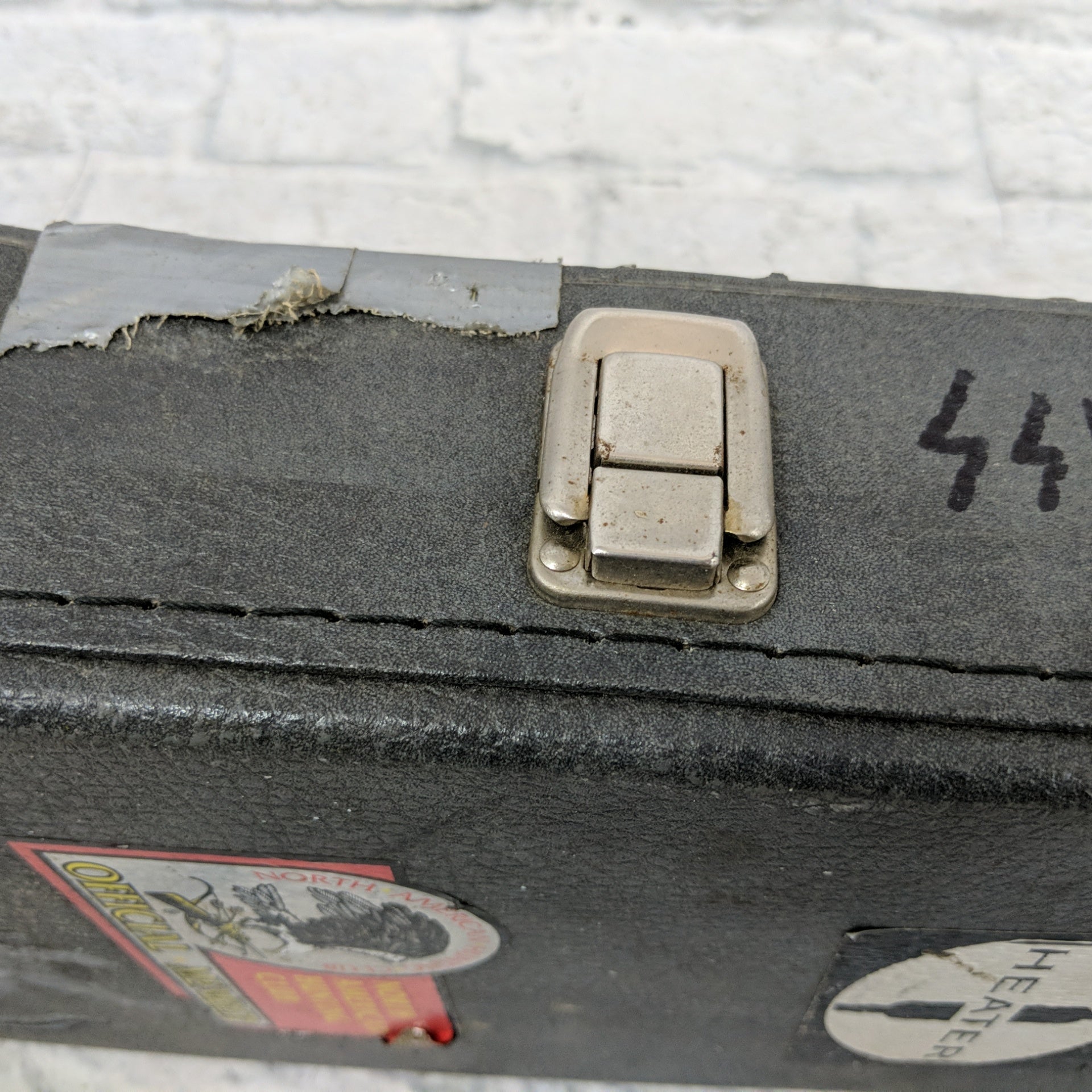 Hardshell Bass Case Grey Covered in Stickers