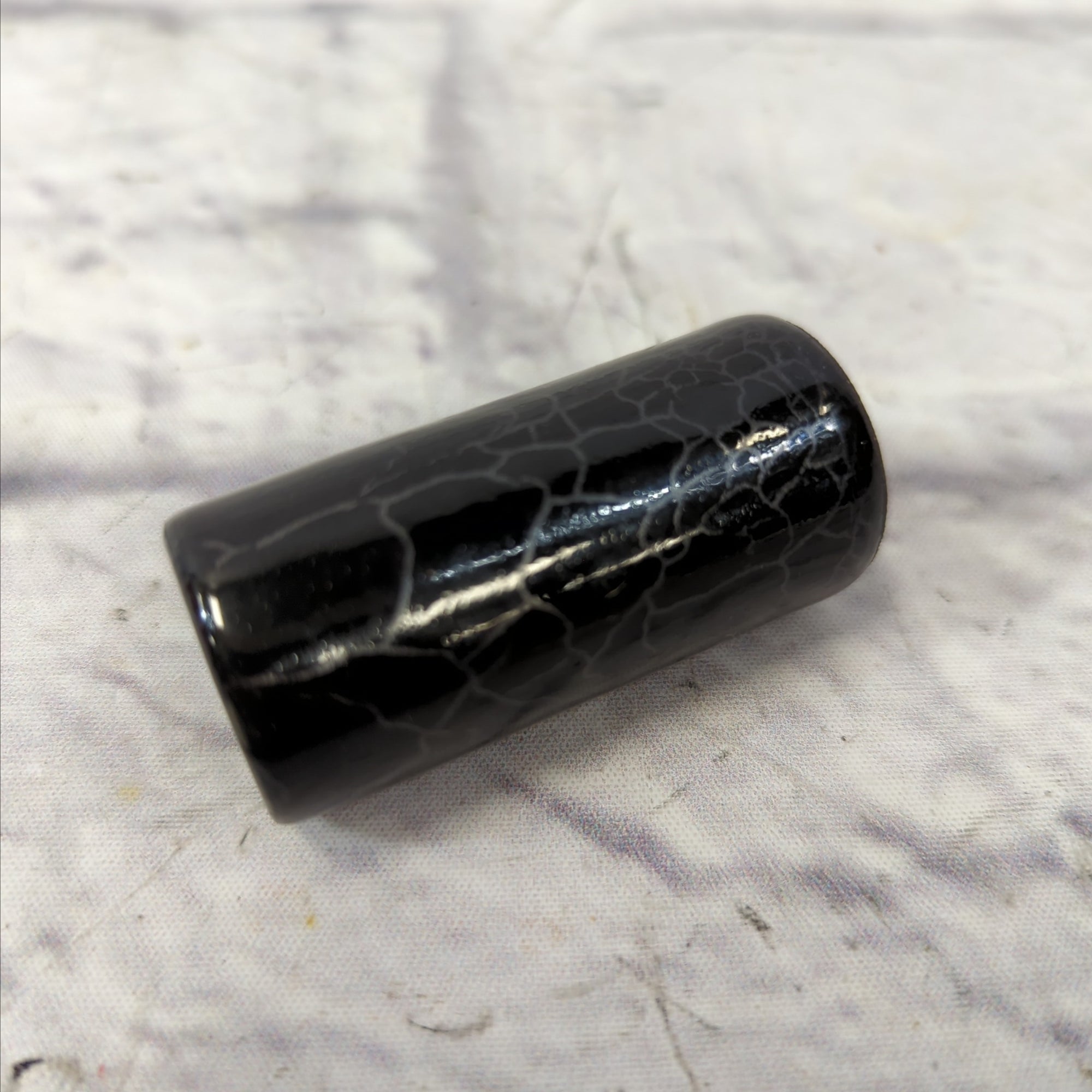 Unknown Black Ceramic Slide