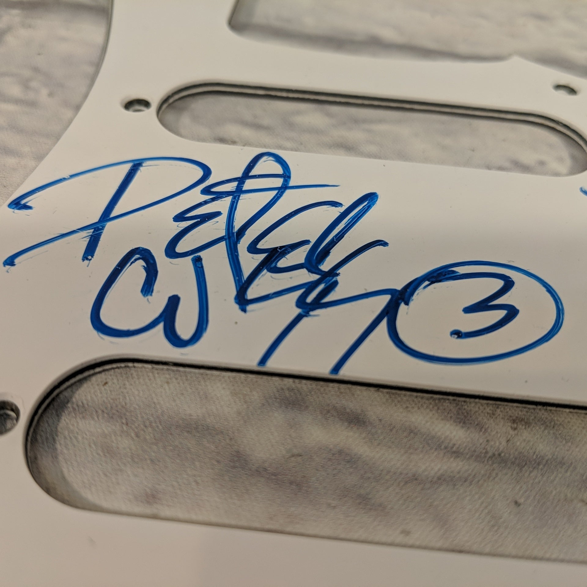 White Strat Pickguard Signed by KISS with Certificate of Authenticity