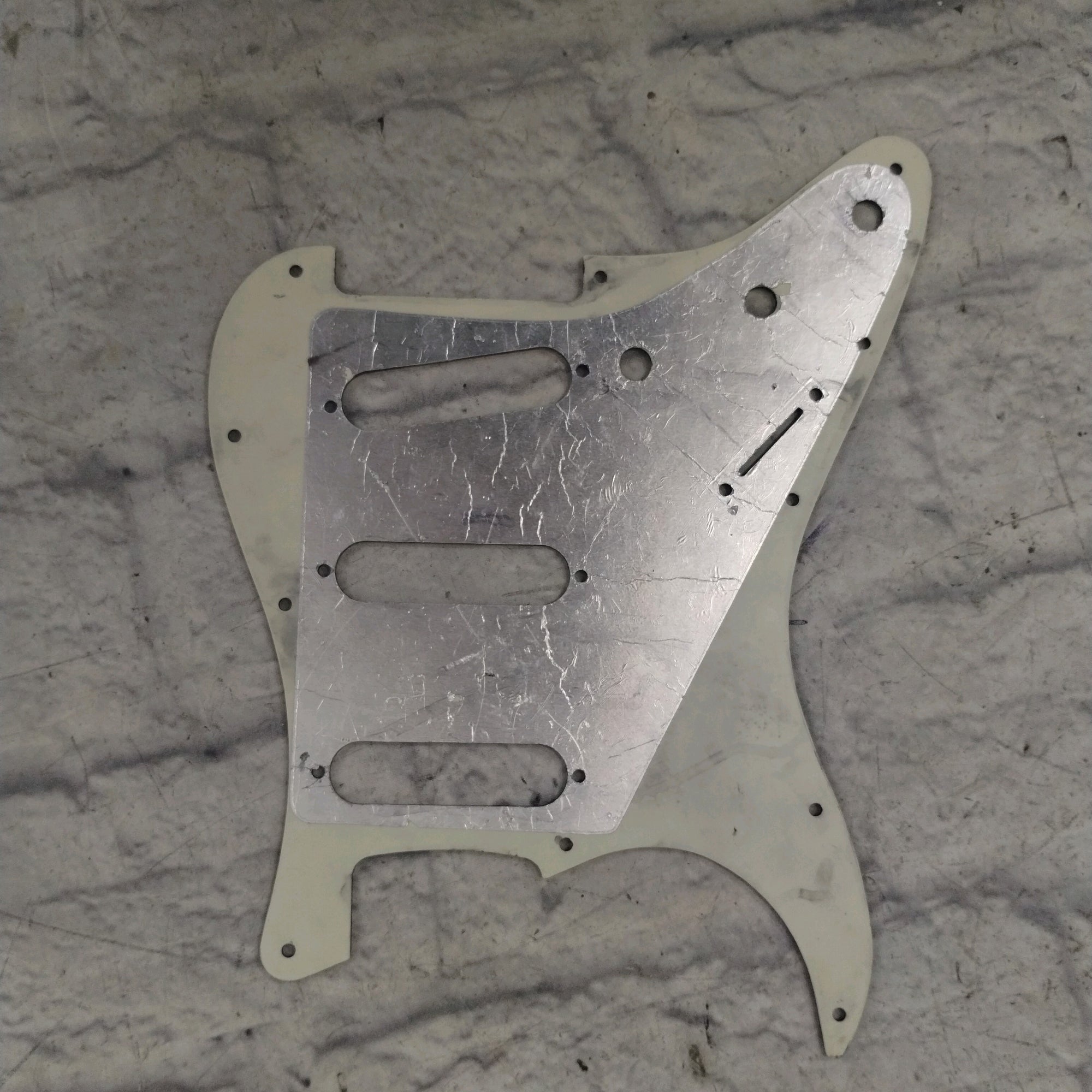 Unknown Pearloid Strat Pickguard